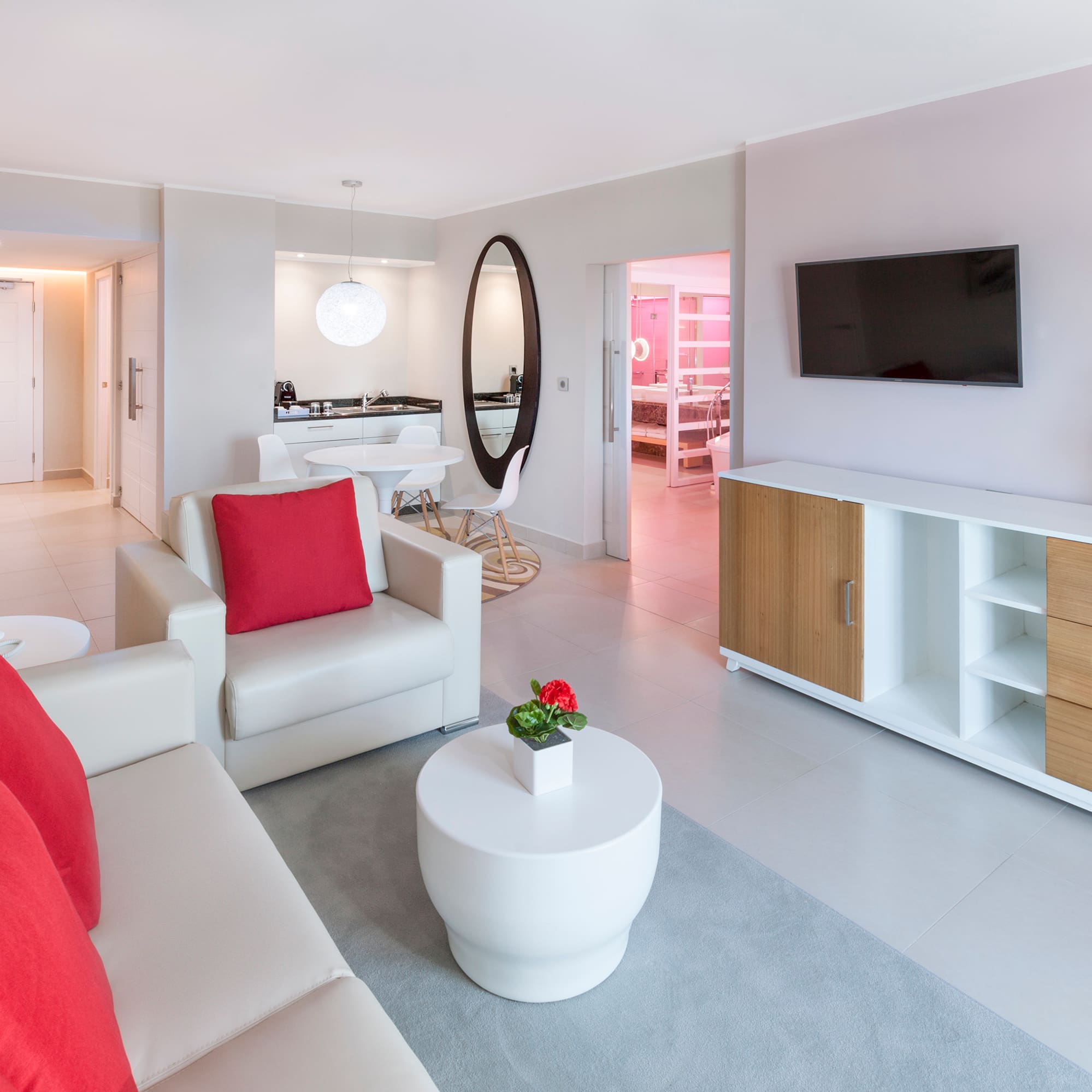 a living room with a television and a couch