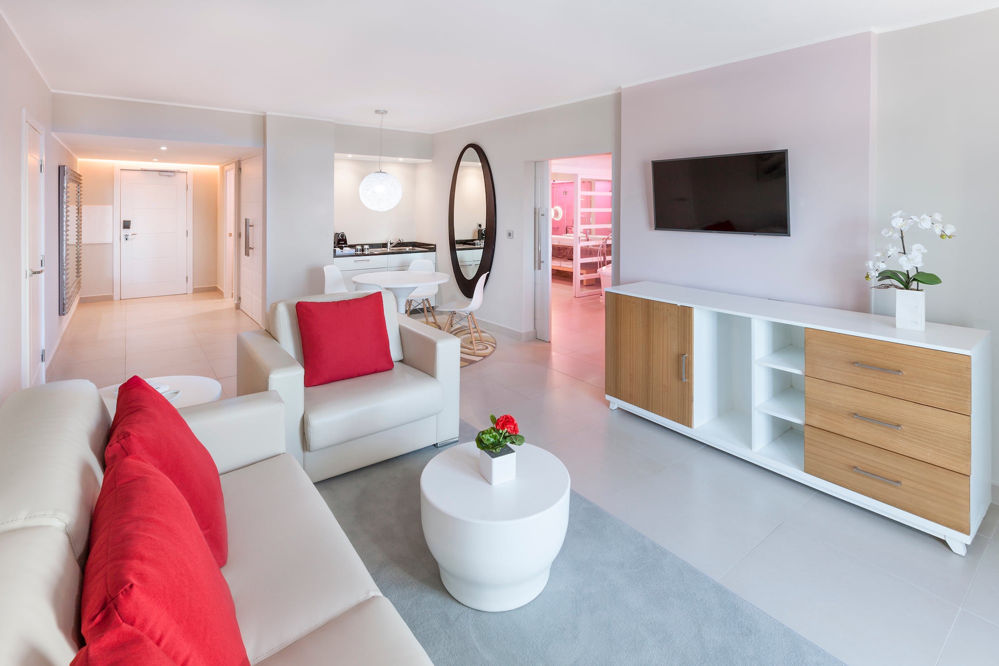 a living room with a television and a couch