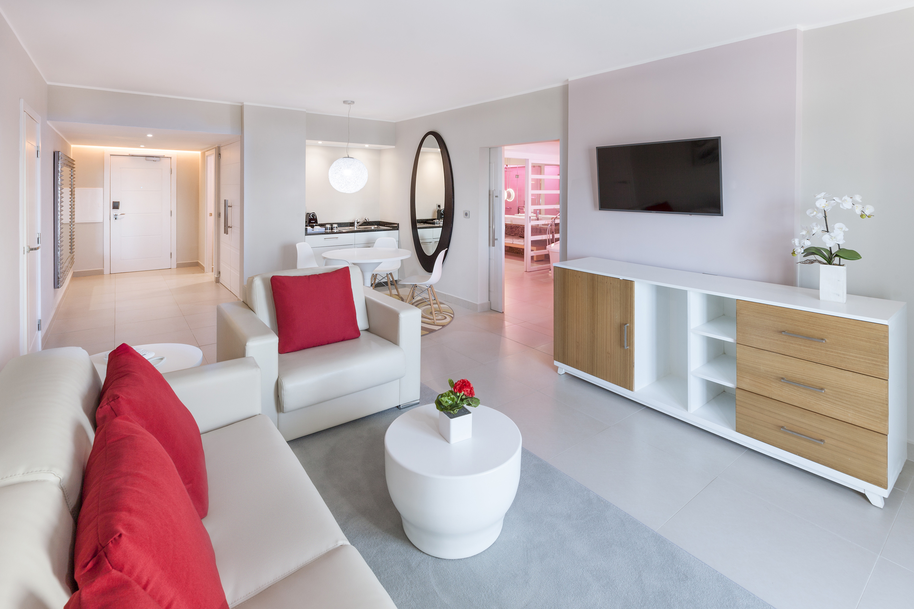 a living room with a television and a couch