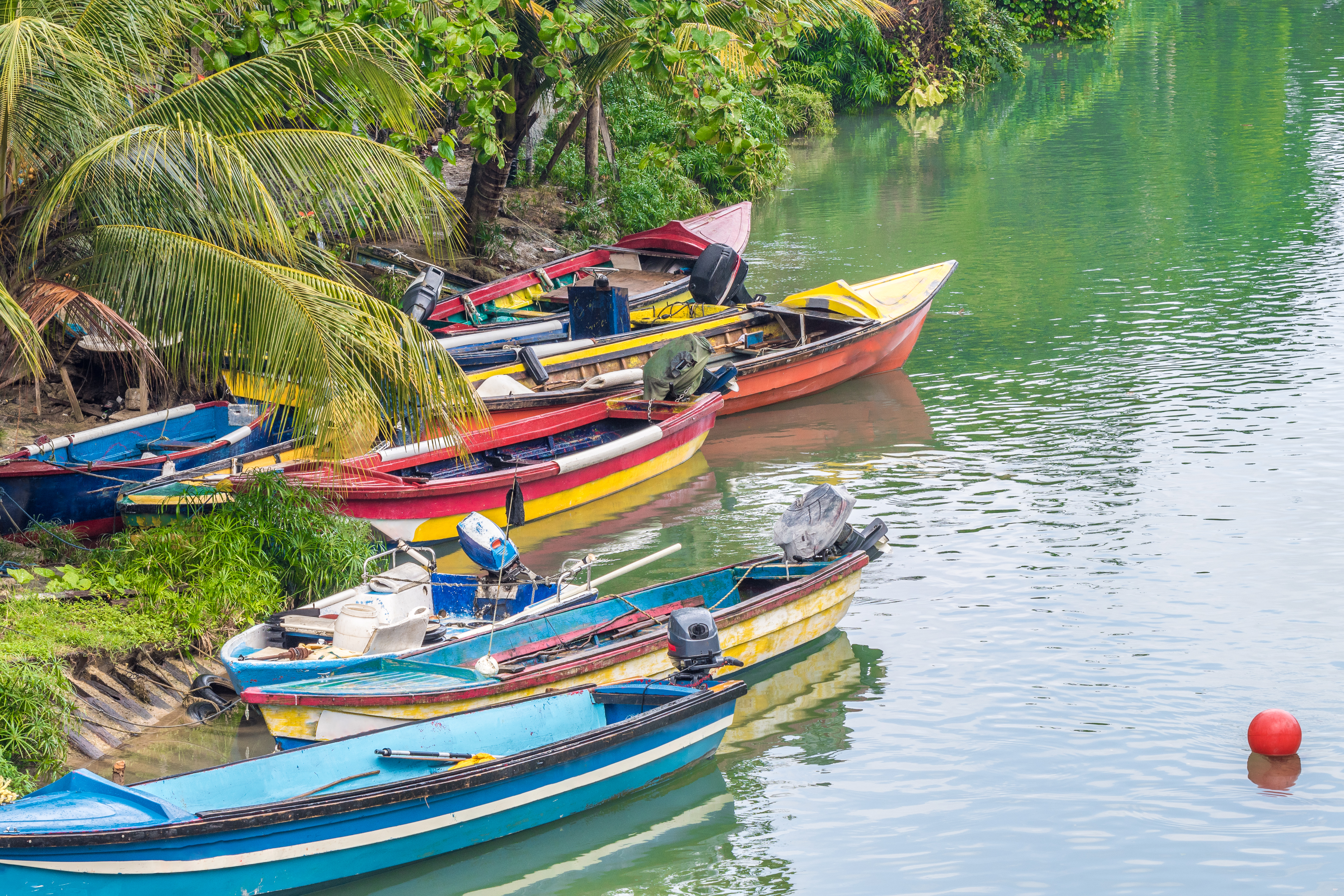 a group of boats in a river