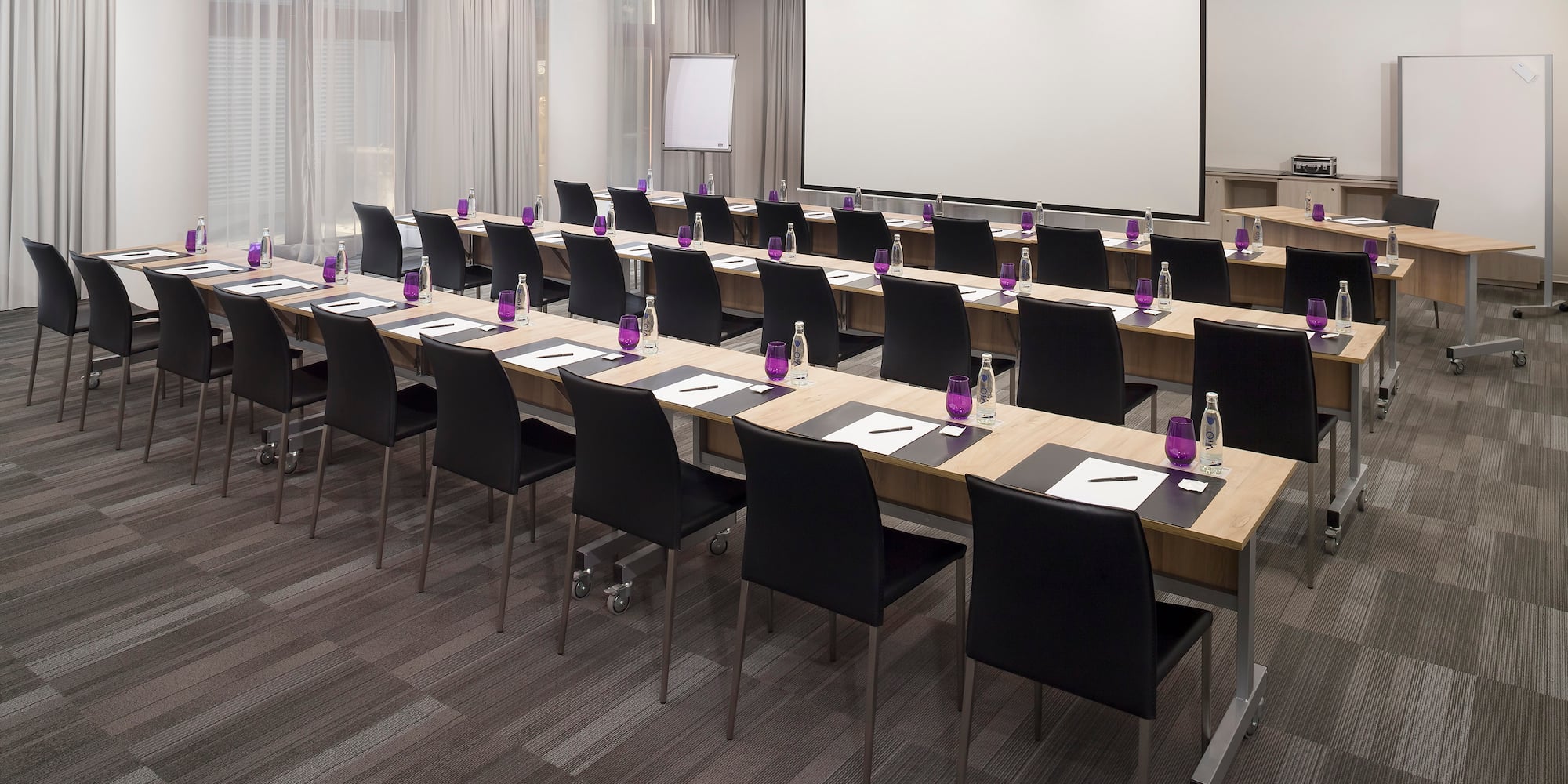 a room with tables and chairs