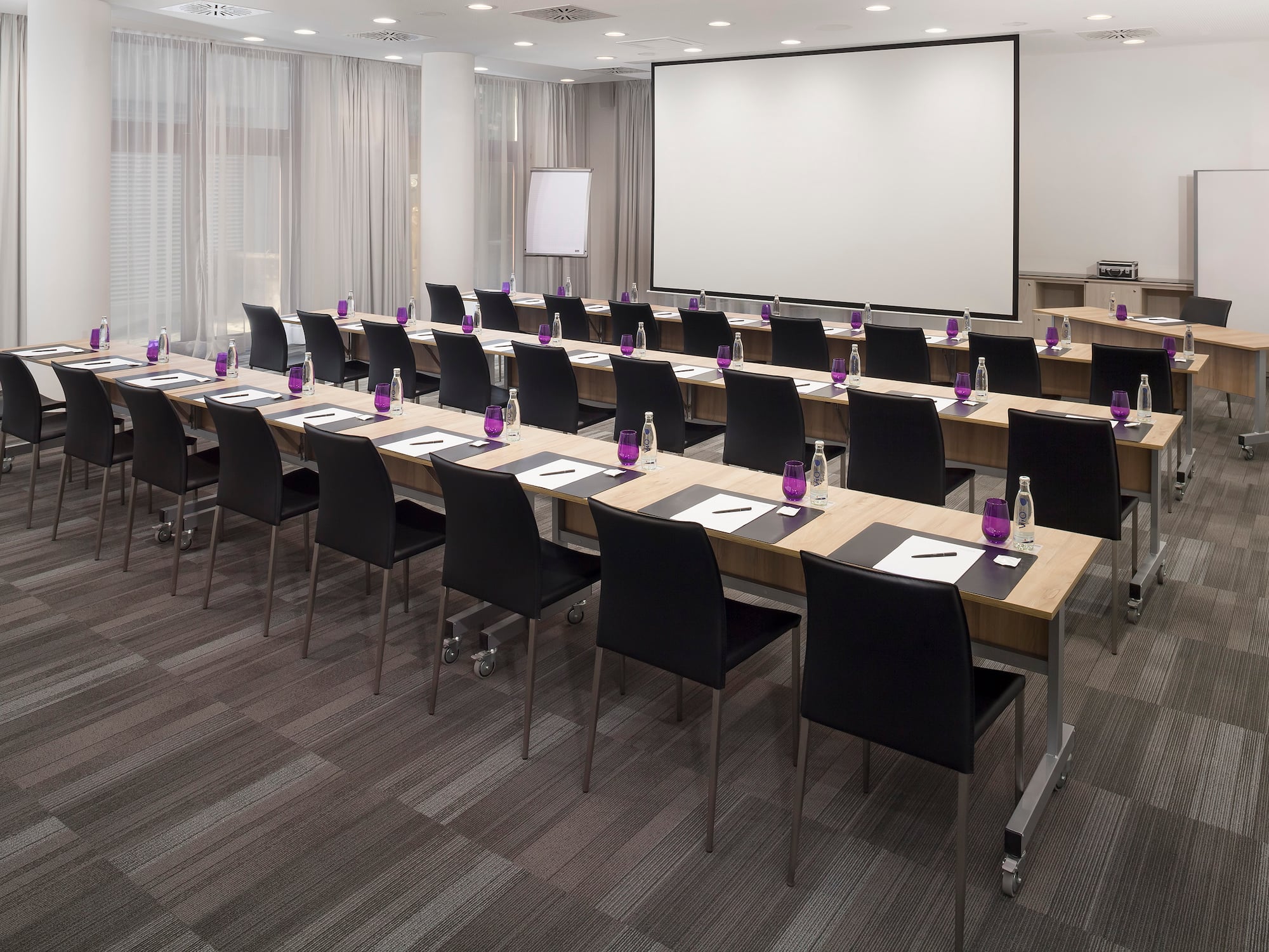 a room with tables and chairs