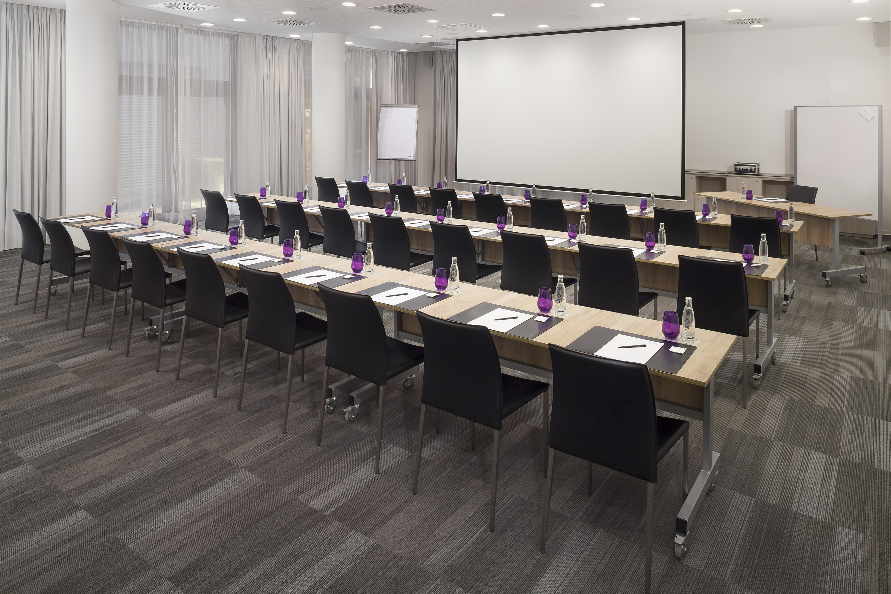 a room with tables and chairs