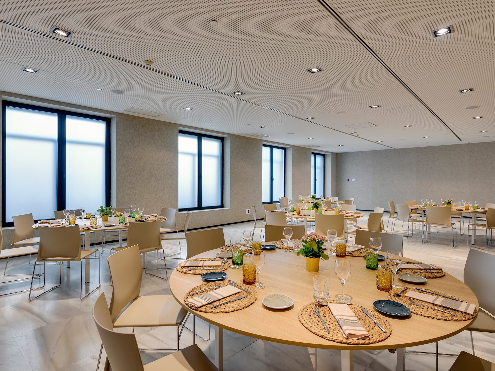 a room with tables and chairs