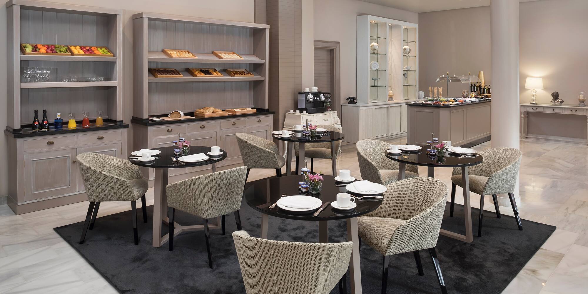 a room with tables and chairs