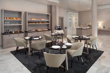 a room with tables and chairs