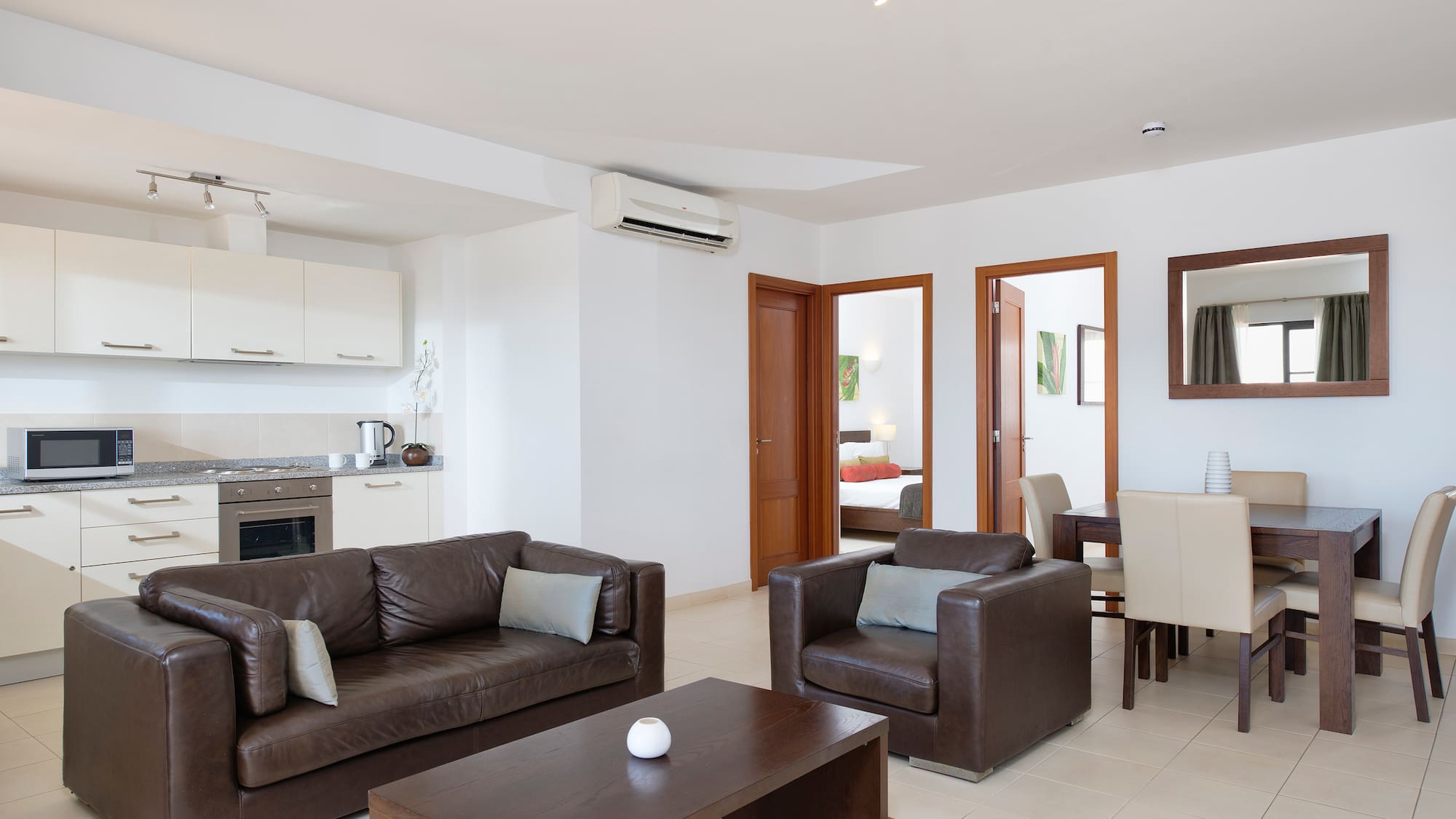 a living room with a couch and a table