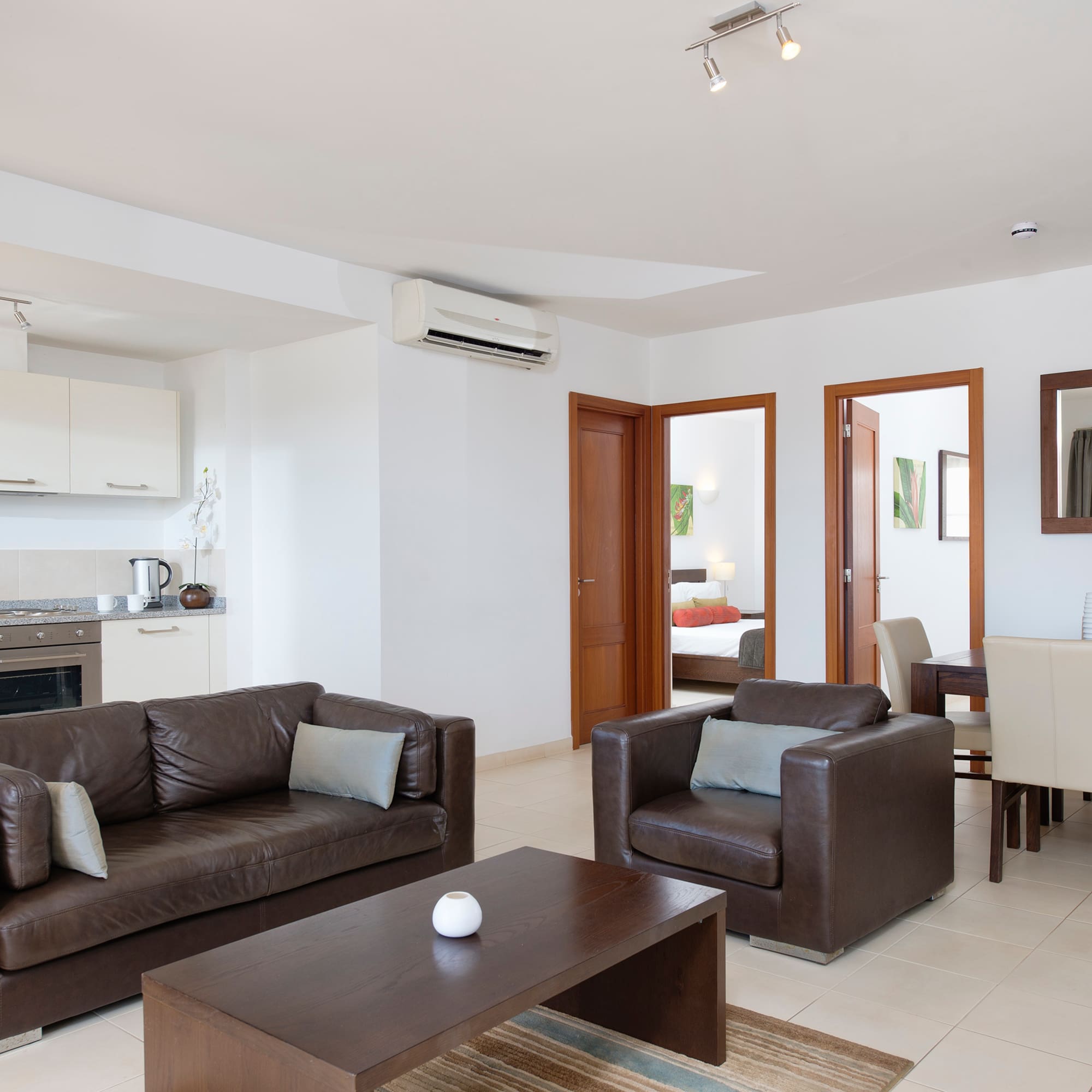 a living room with a couch and a table