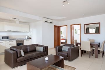 a living room with a couch and a table