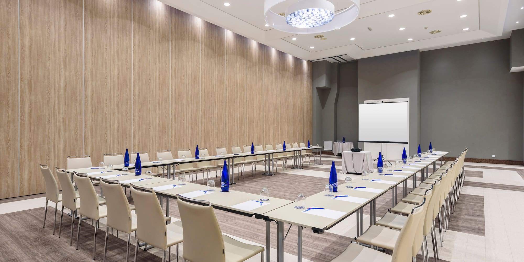 a room with tables and chairs