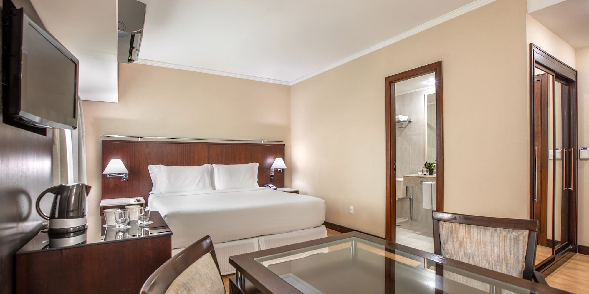 a room with a bed and a table