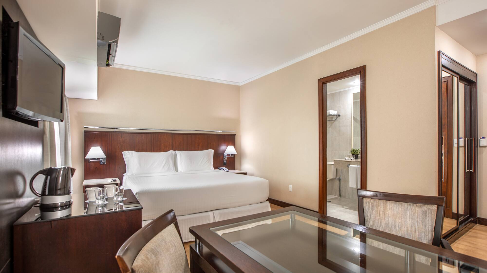 a room with a bed and a table