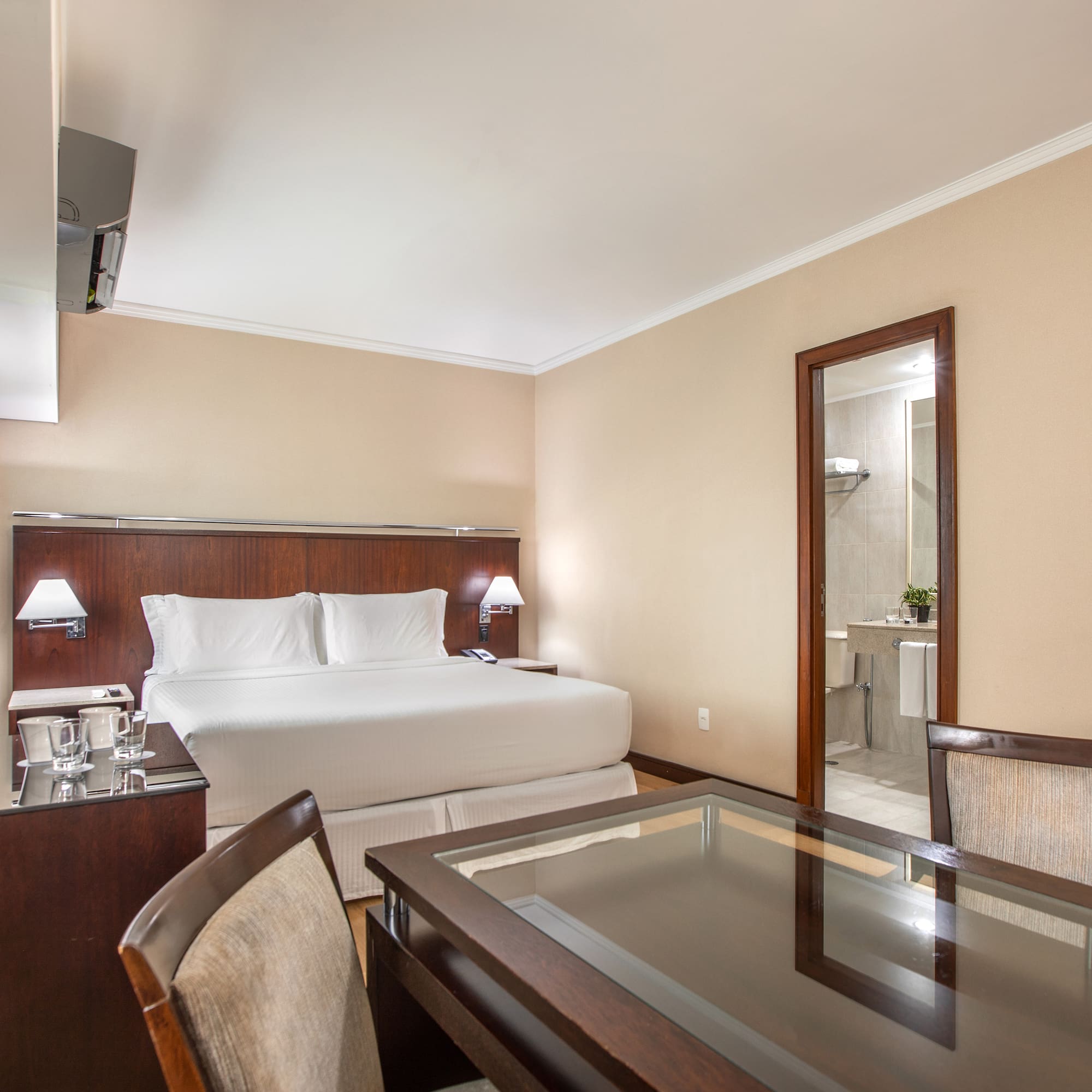 a room with a bed and a table