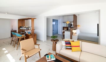 a room with a couch and a bed