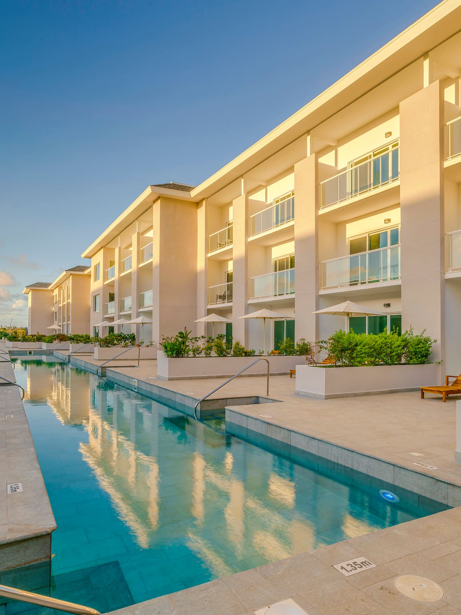a pool in front of a building
