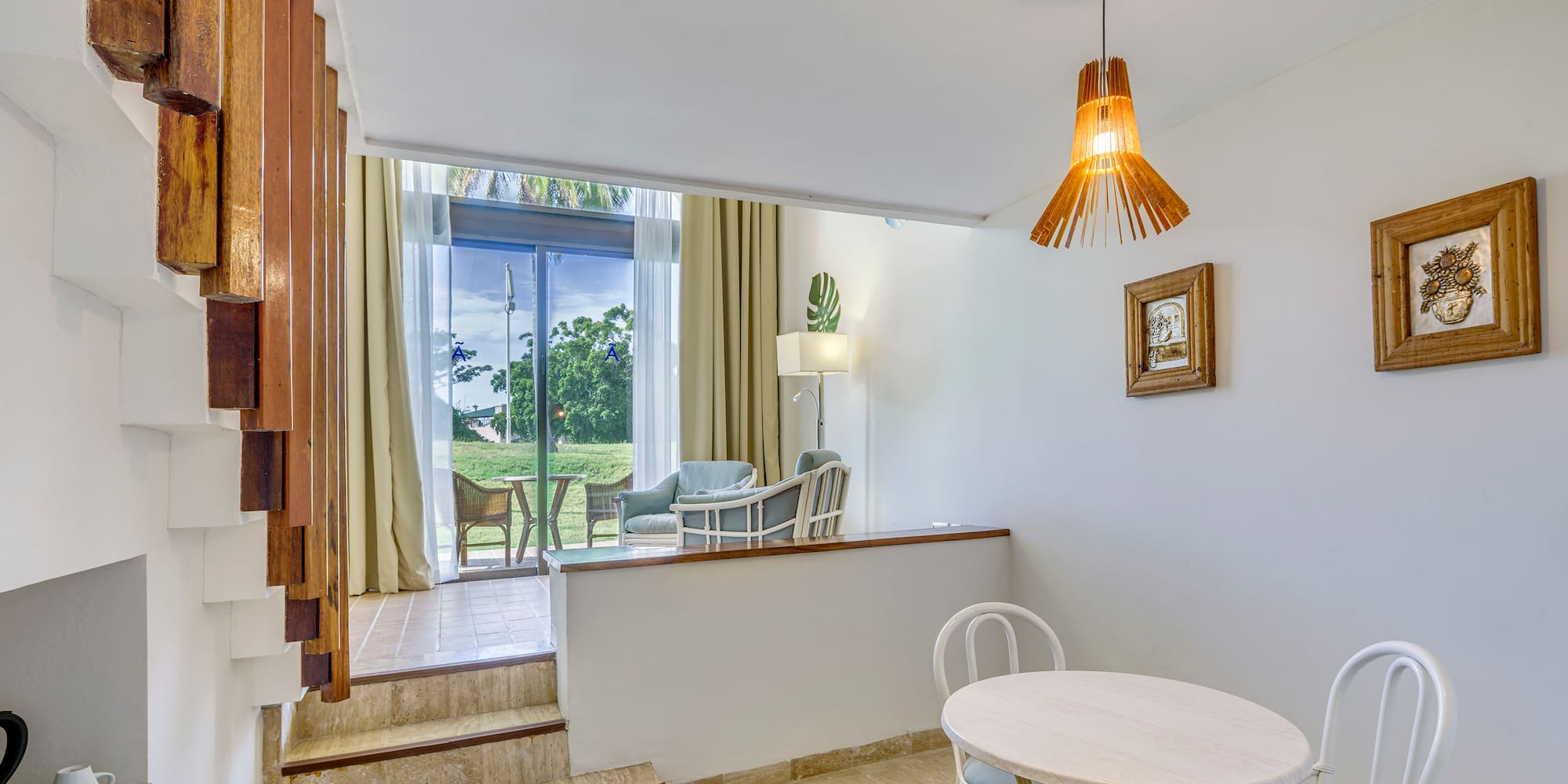 a room with a table and chairs