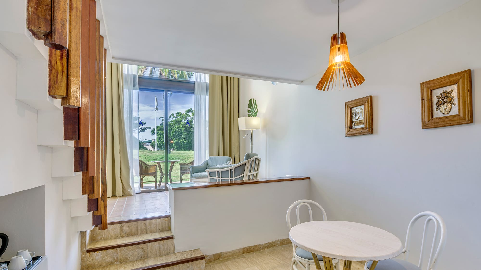 a room with a table and chairs