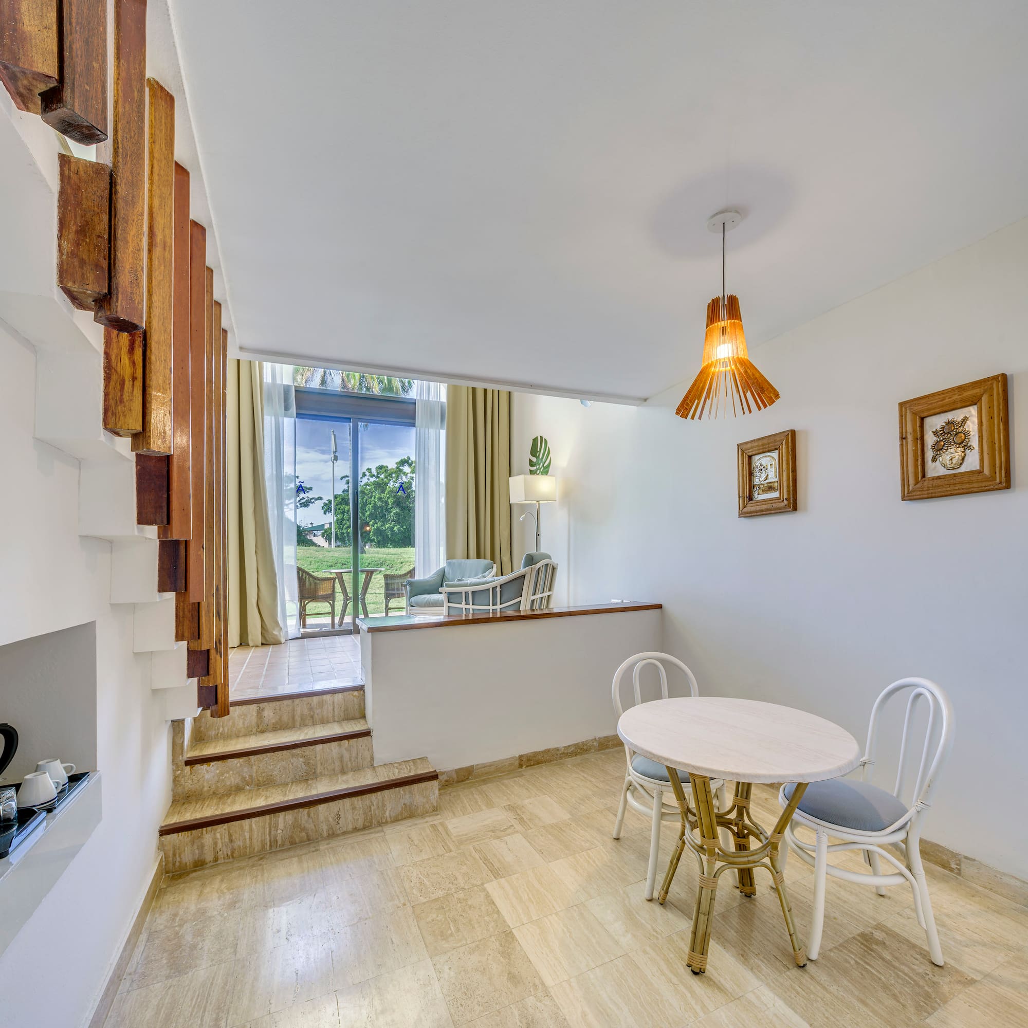 a room with a table and chairs