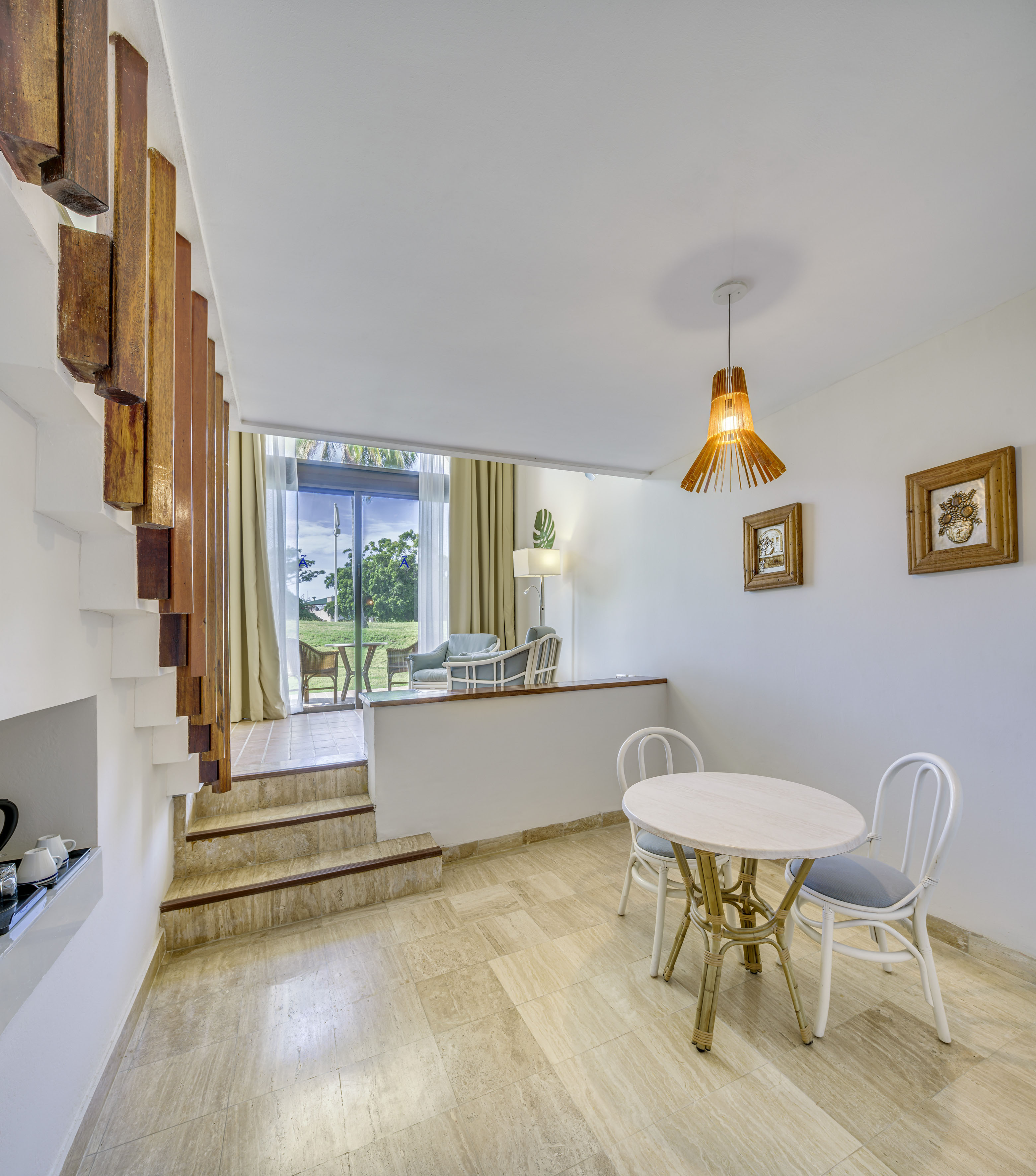 a room with a table and chairs