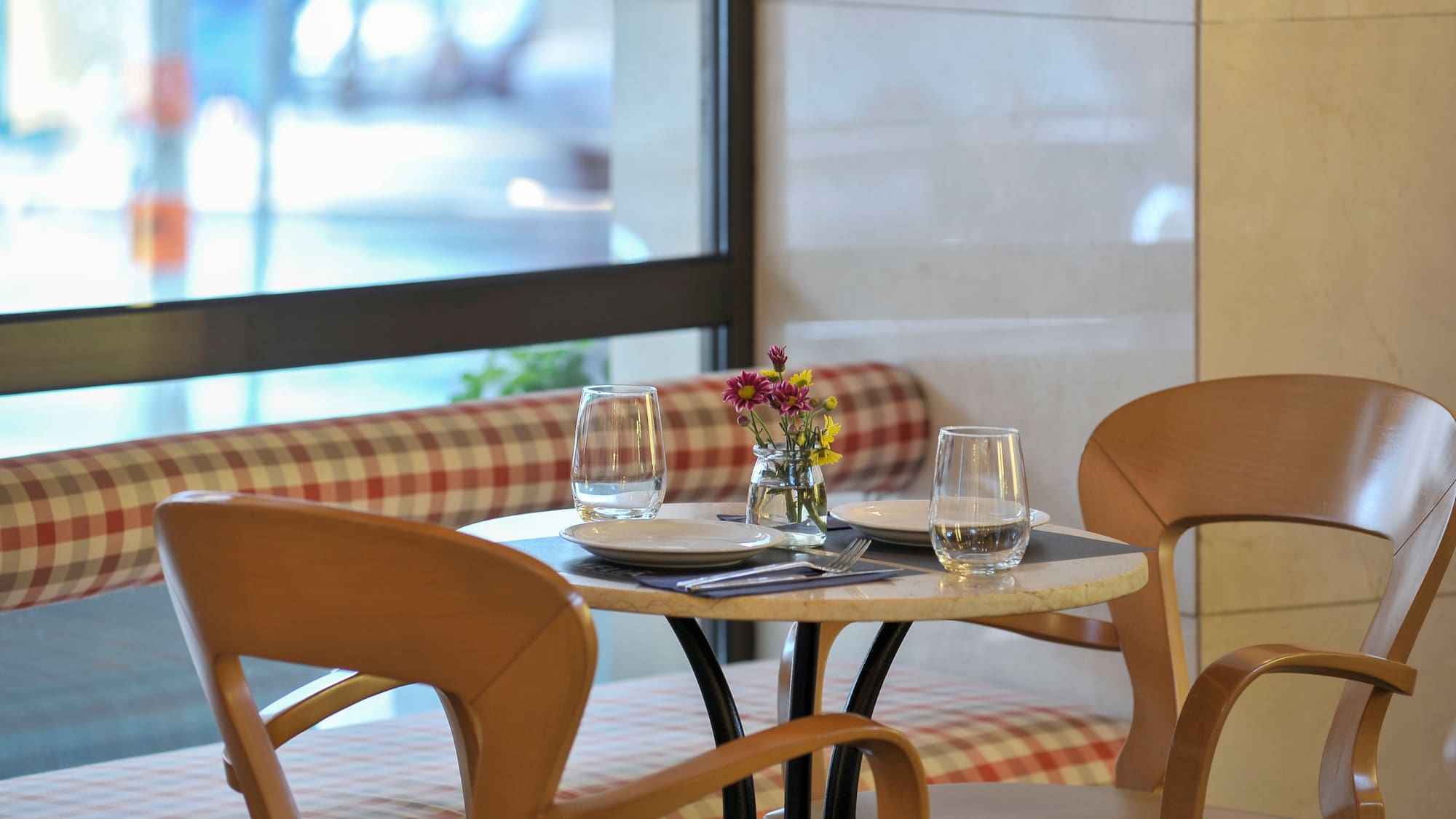 a table with plates and glasses on it