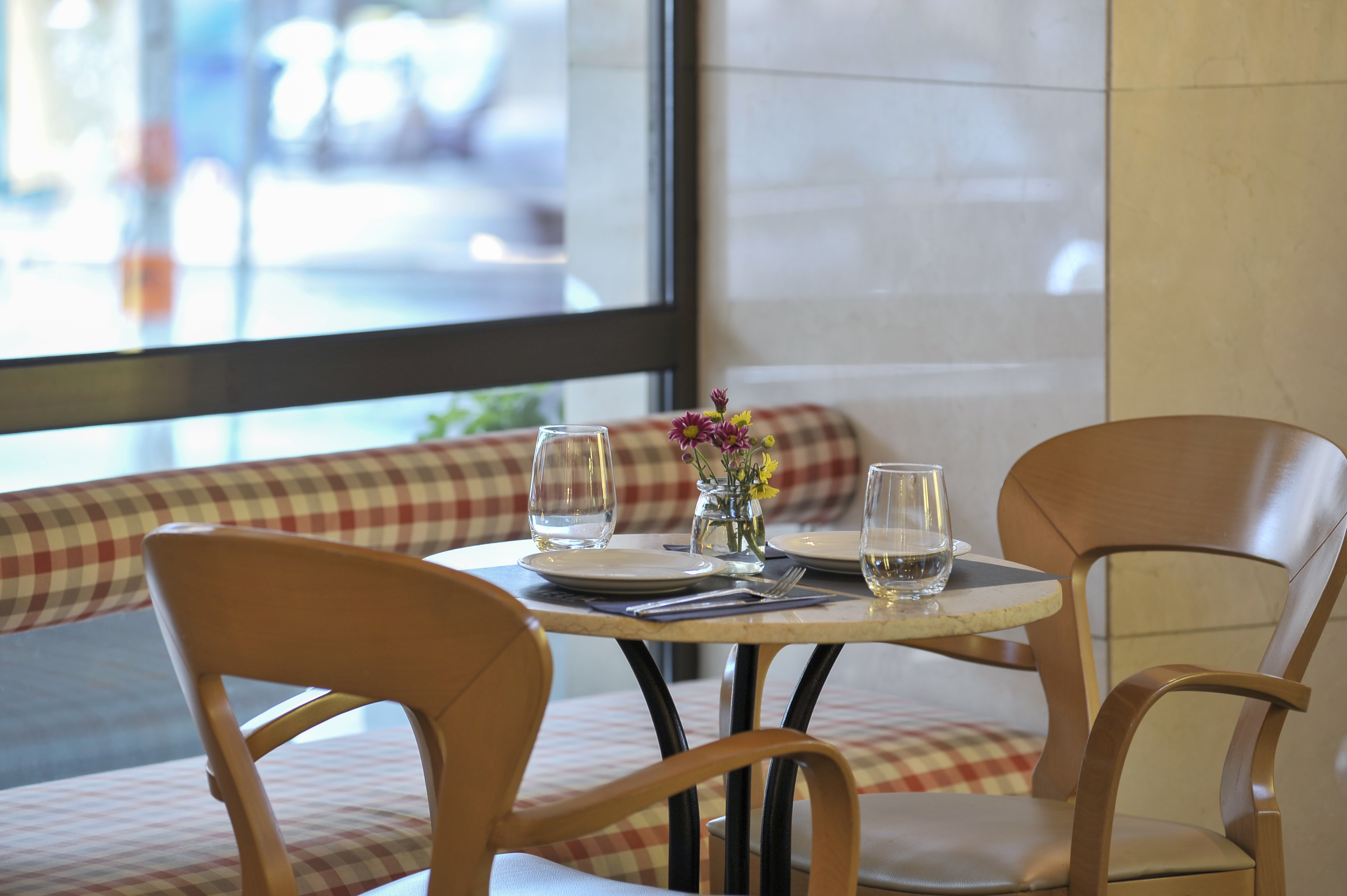 a table with plates and glasses on it