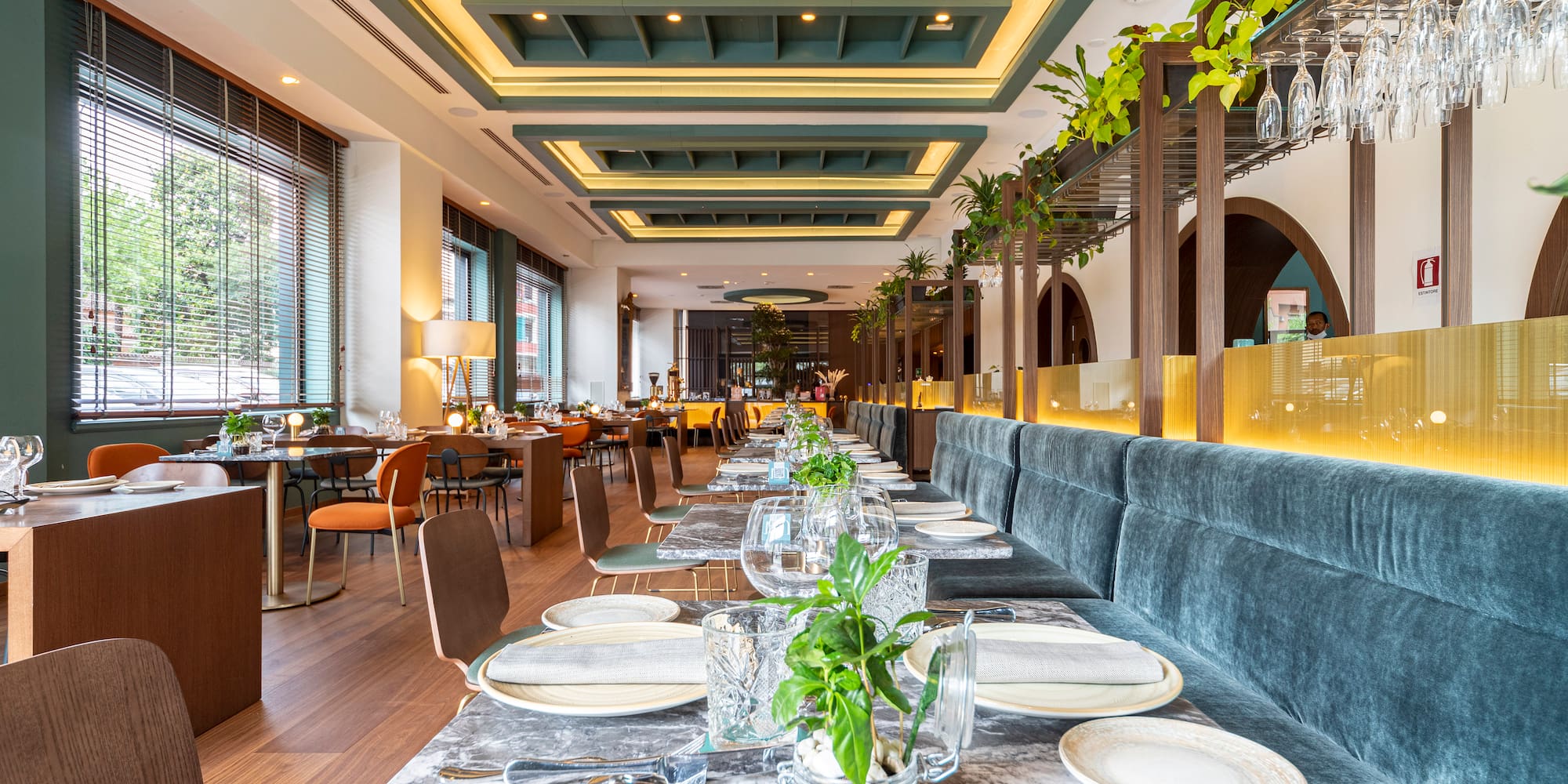 a restaurant with tables and chairs