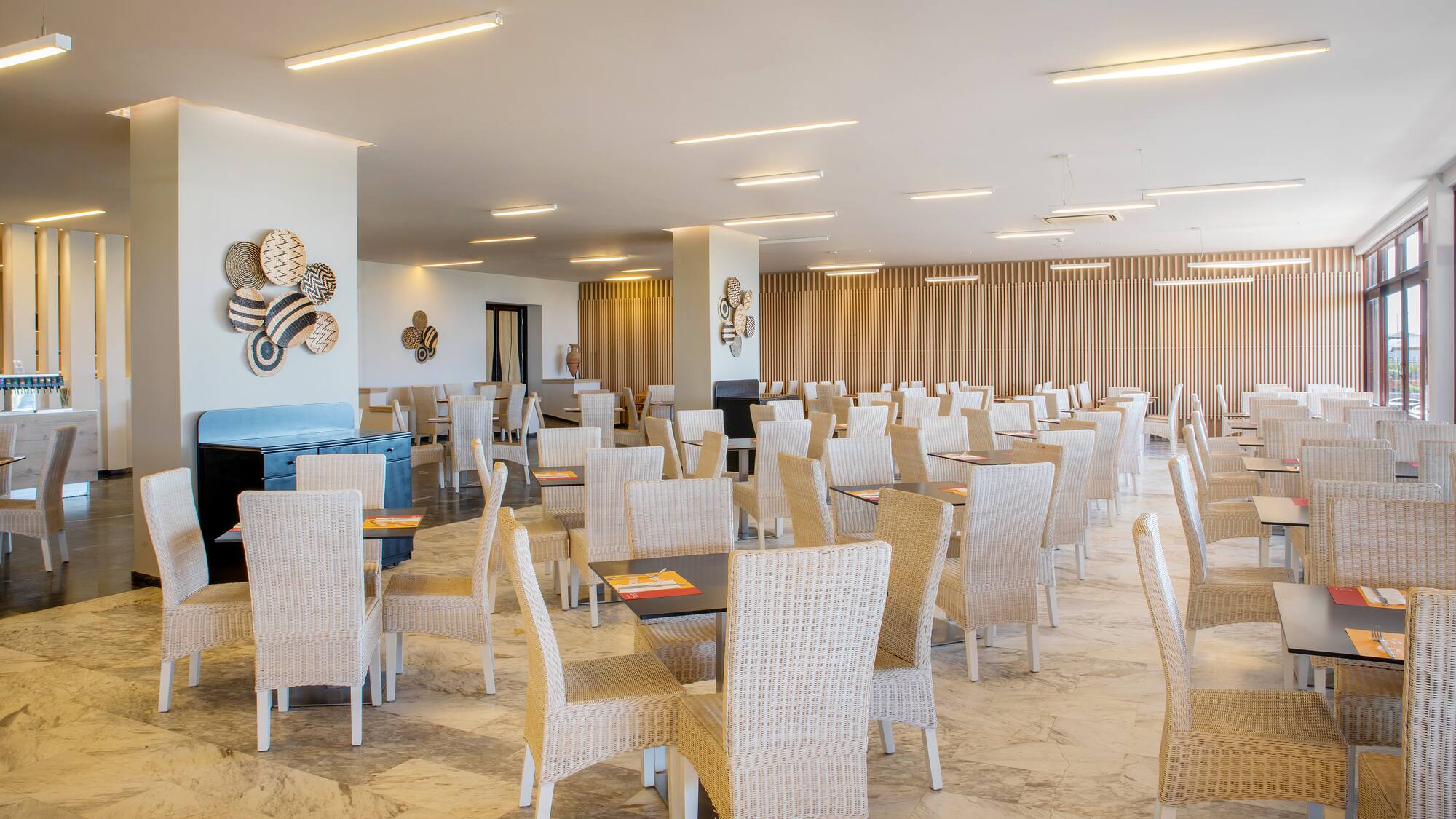 a room with tables and chairs