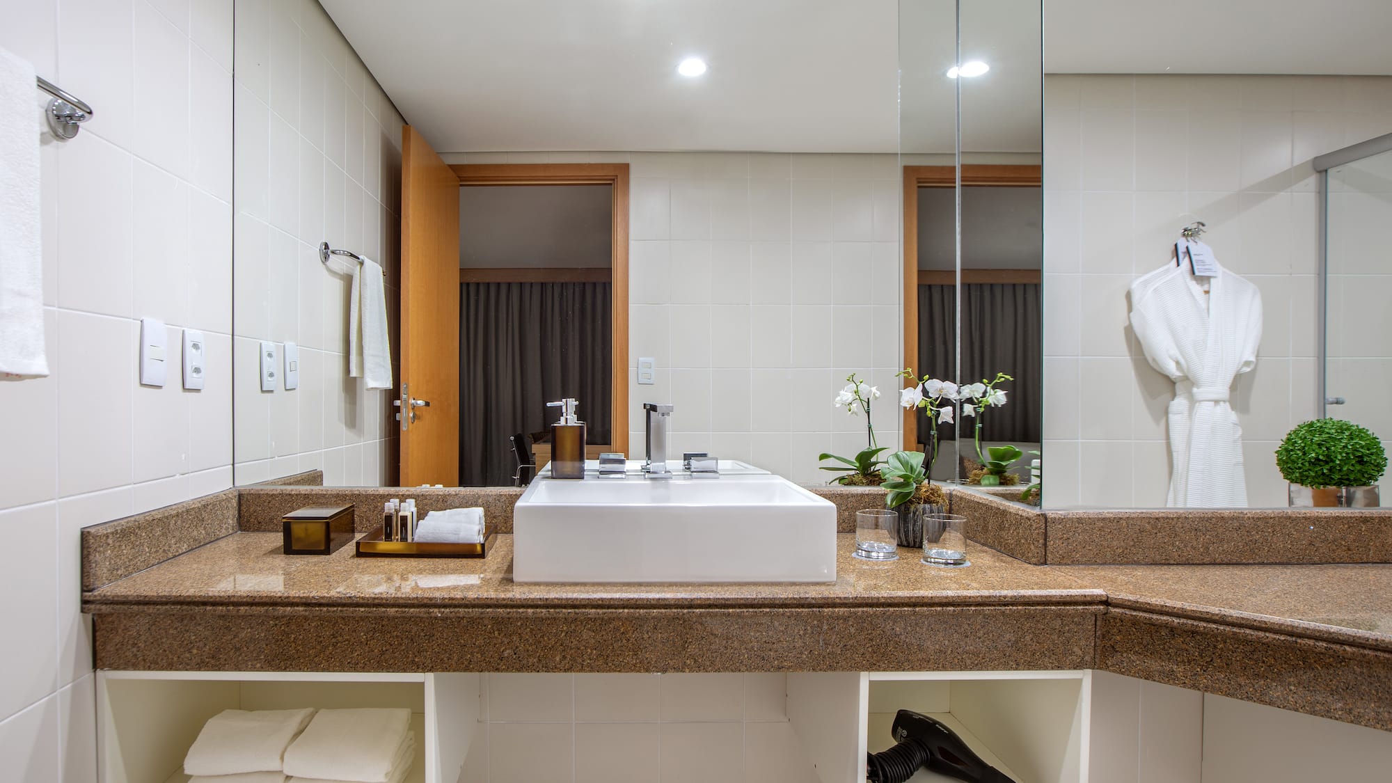 a bathroom with a sink and mirror
