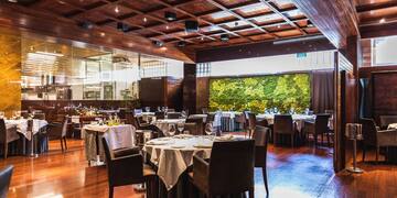 a restaurant with tables and chairs