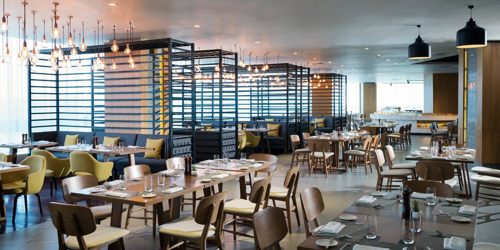 a restaurant with tables and chairs