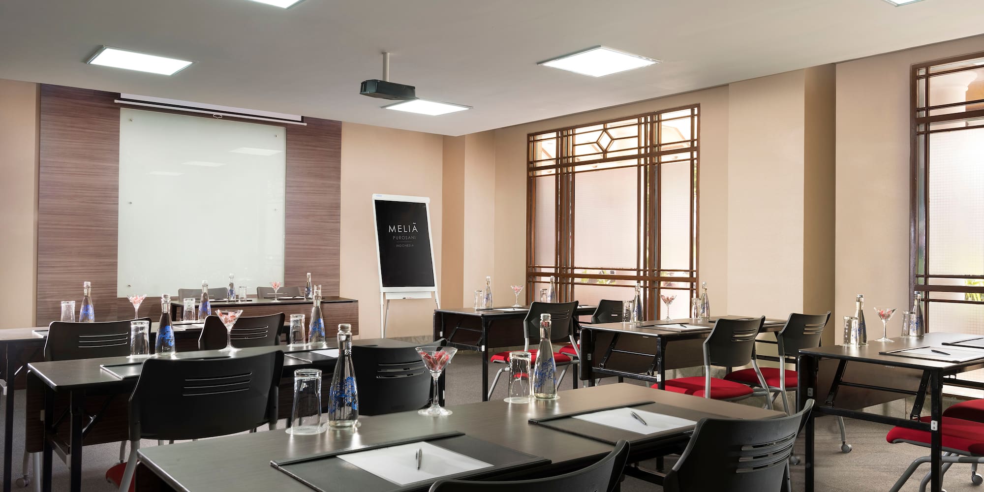 a room with tables and chairs