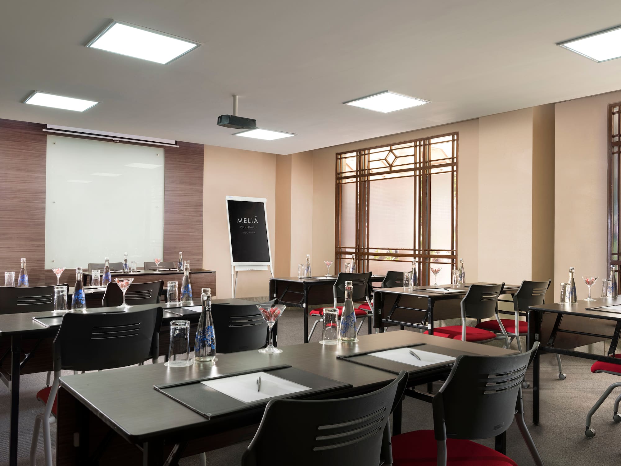 a room with tables and chairs