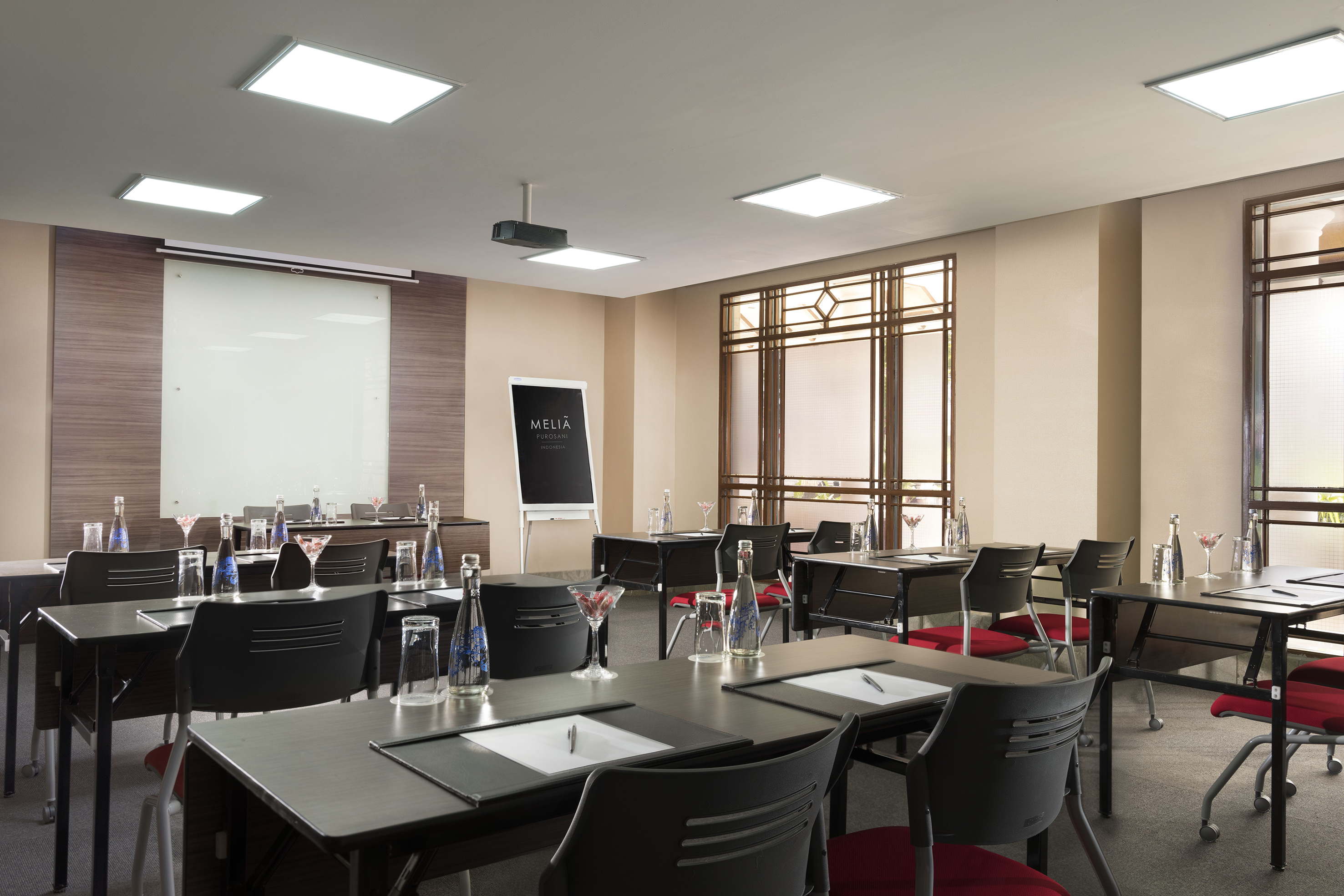 a room with tables and chairs