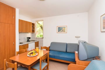 a room with a couch and a tv