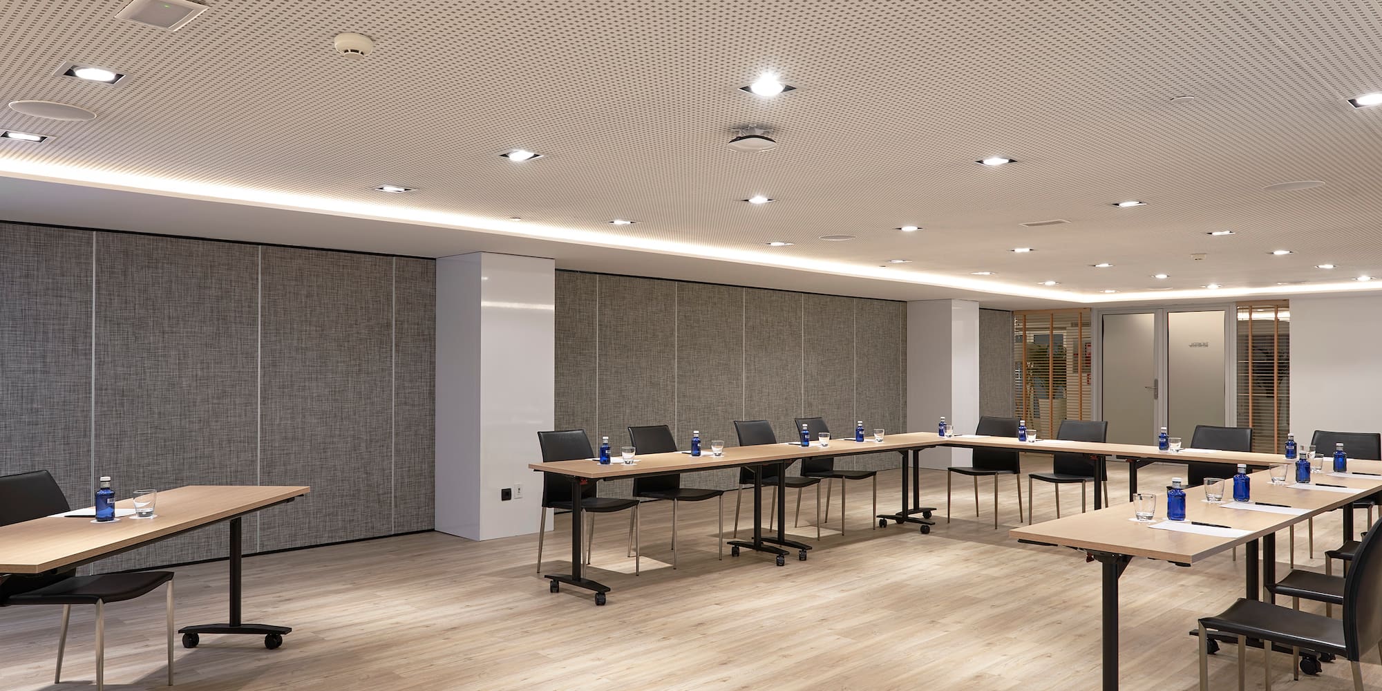 a room with tables and chairs