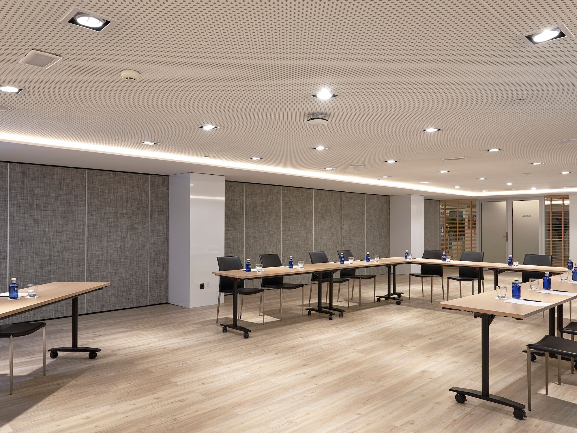 a room with tables and chairs