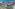 a city with buildings and a beach