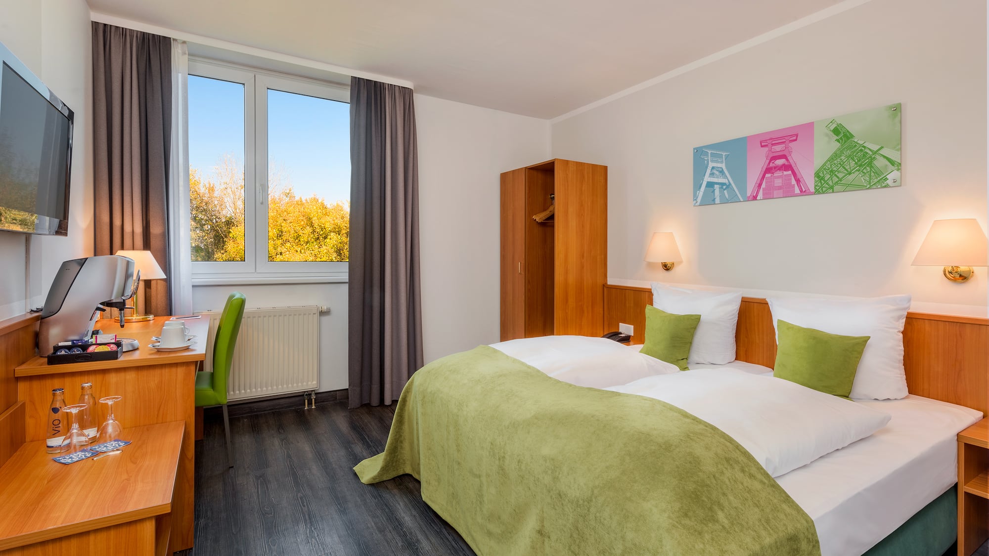 a room with a bed and a desk