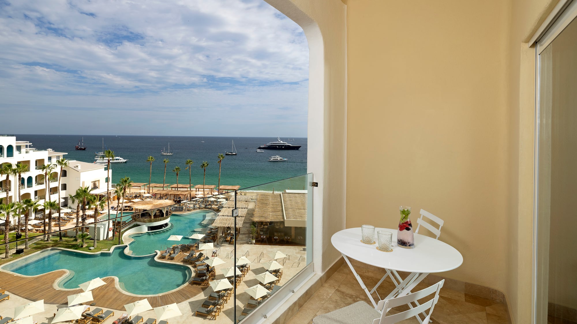 a view of a pool from a balcony