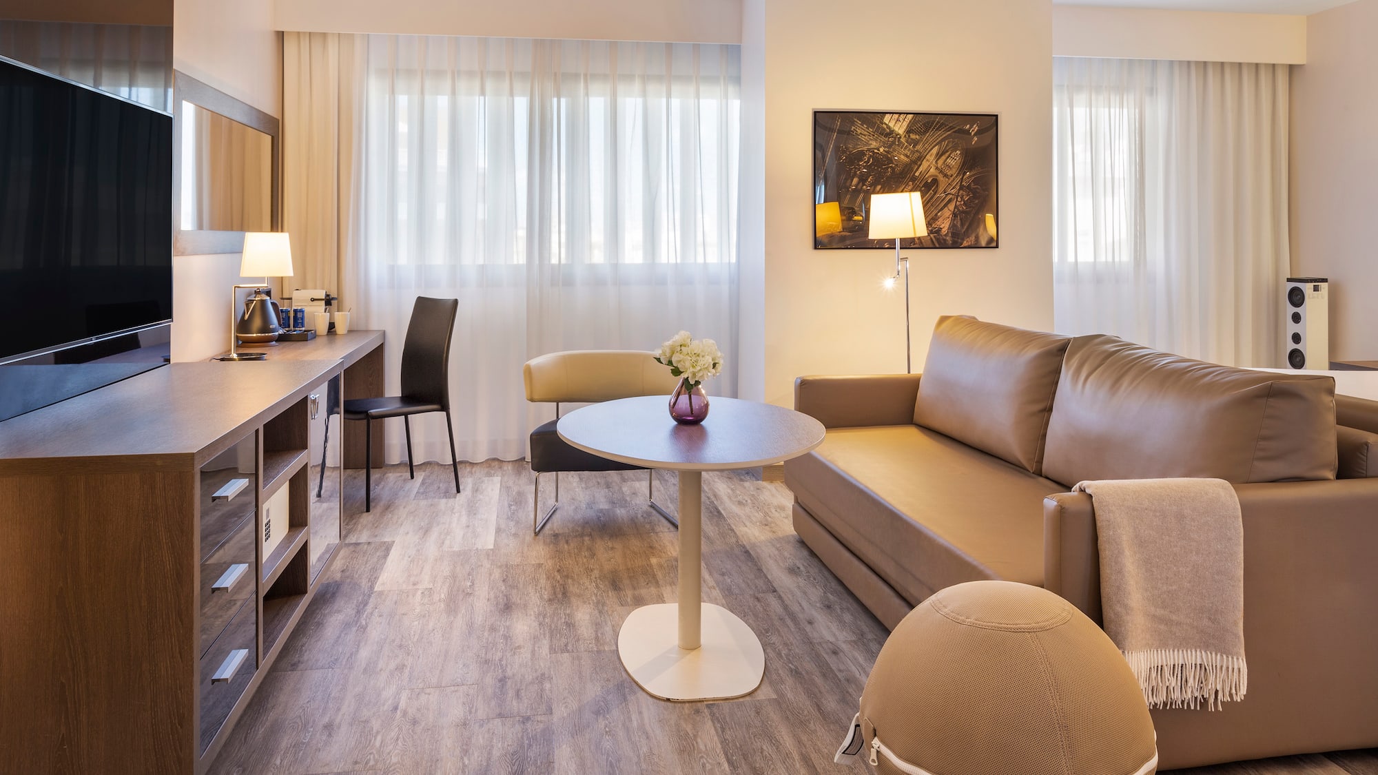 a living room with a couch and a table