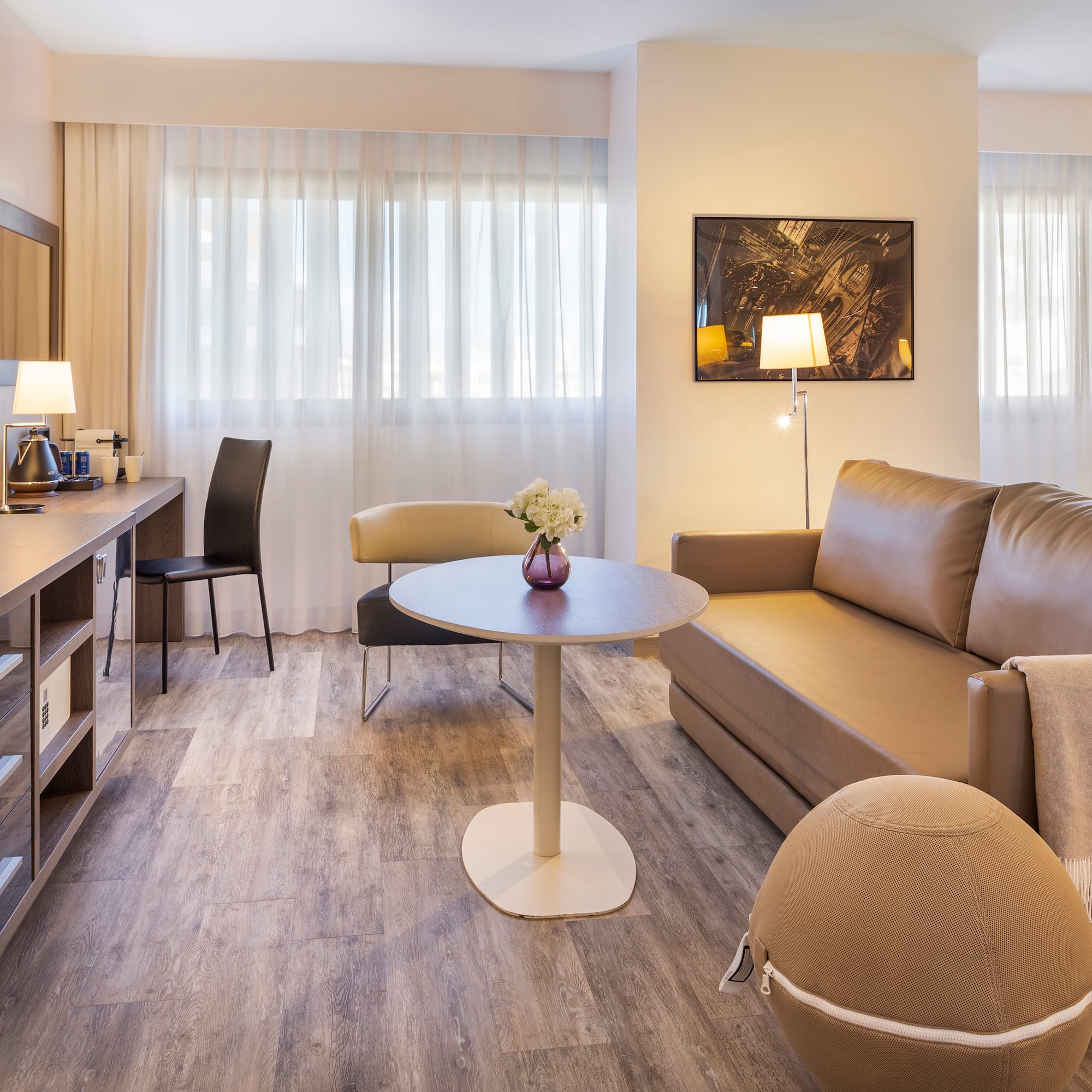 a living room with a couch and a table