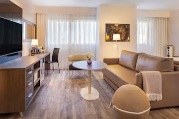 a living room with a couch and a table
