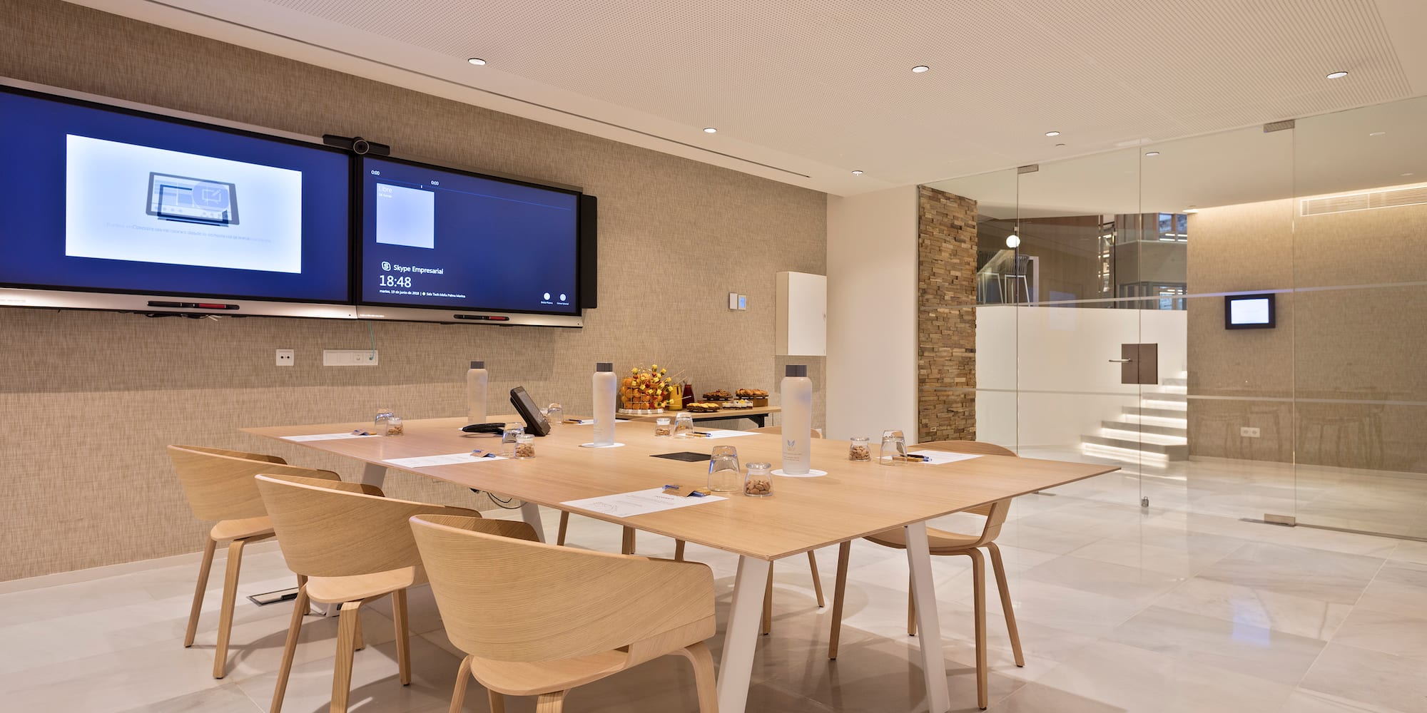 a room with a table and chairs