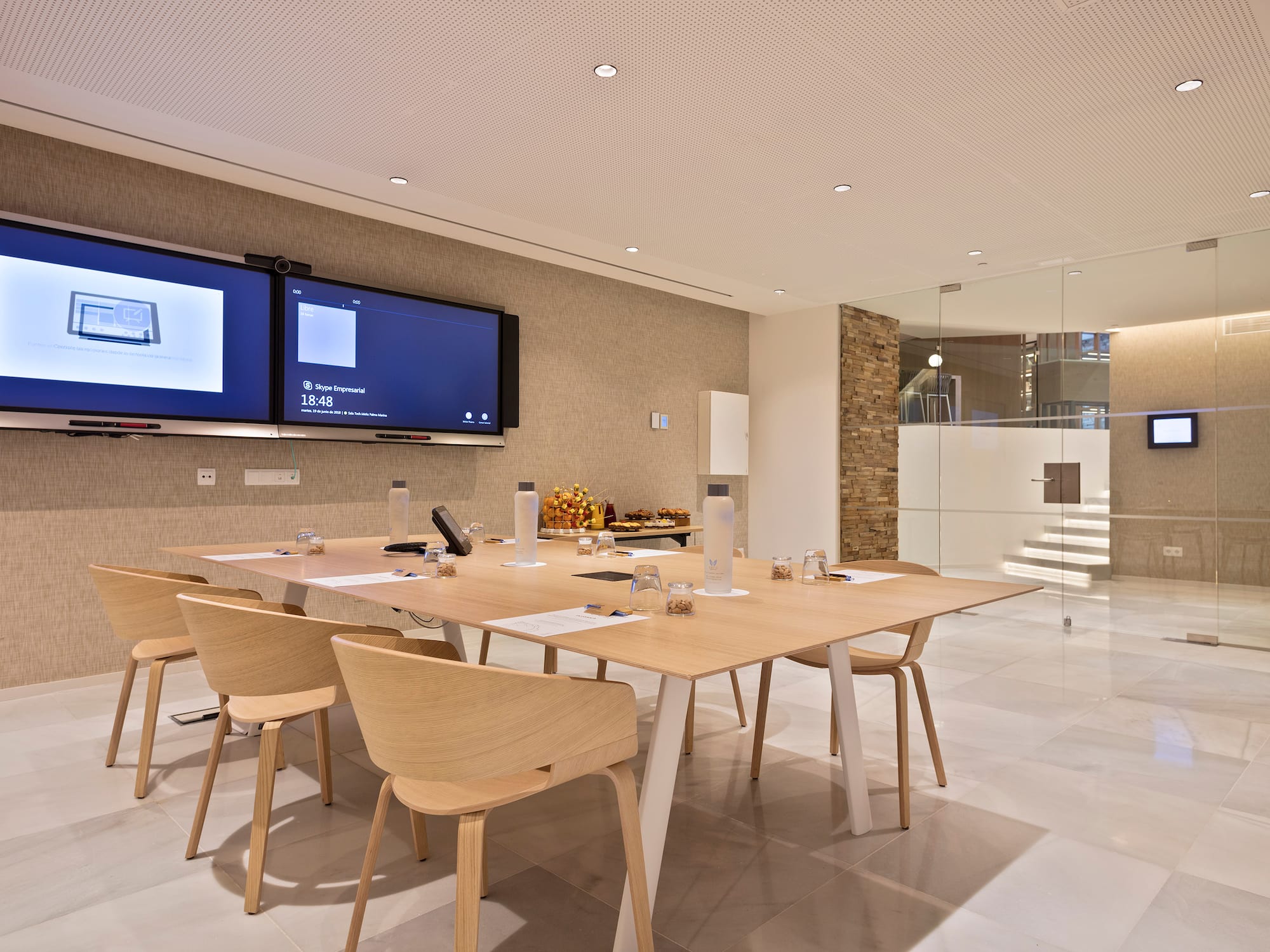 a room with a table and chairs