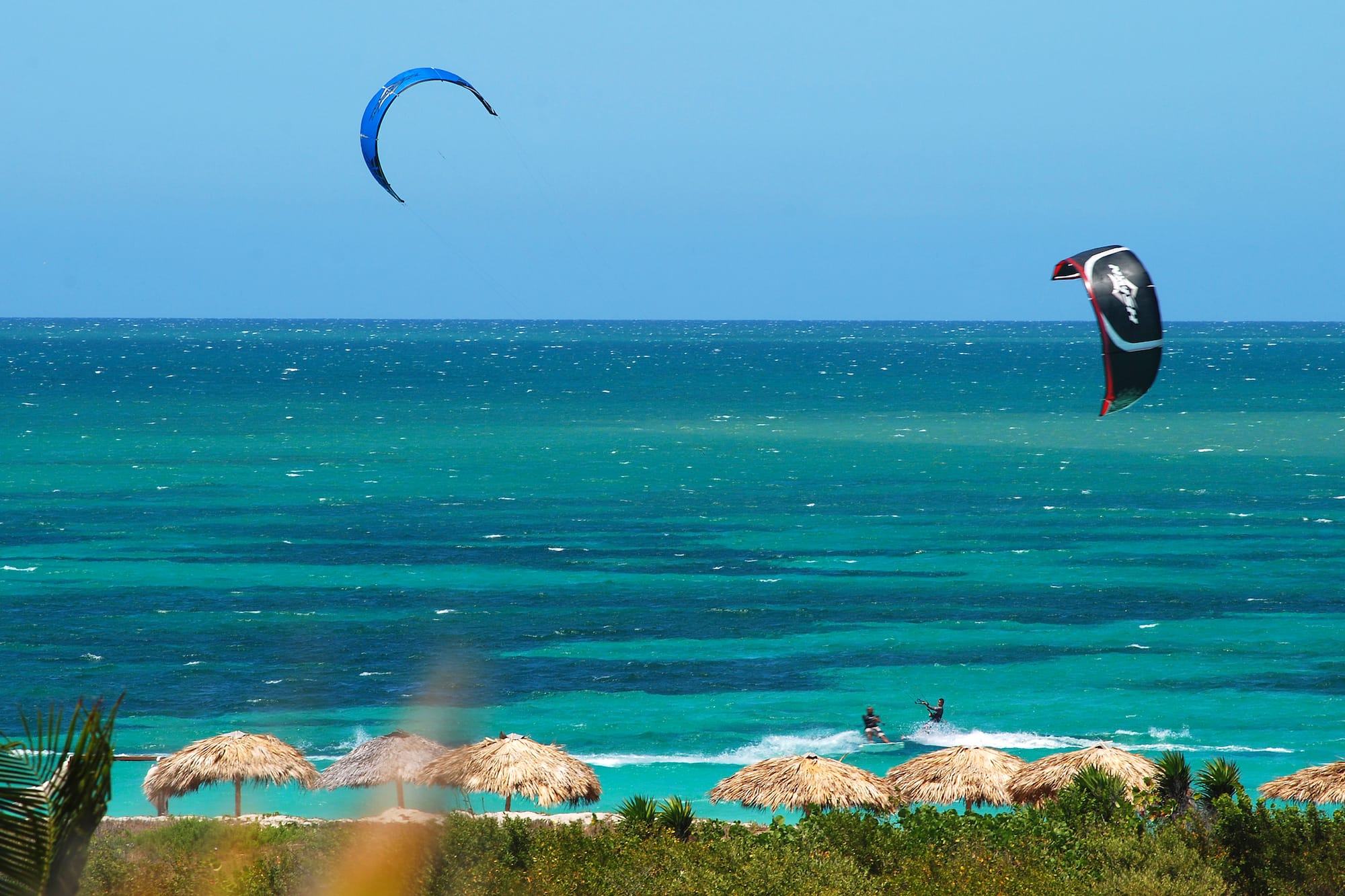 a person kite surfing on the ocean