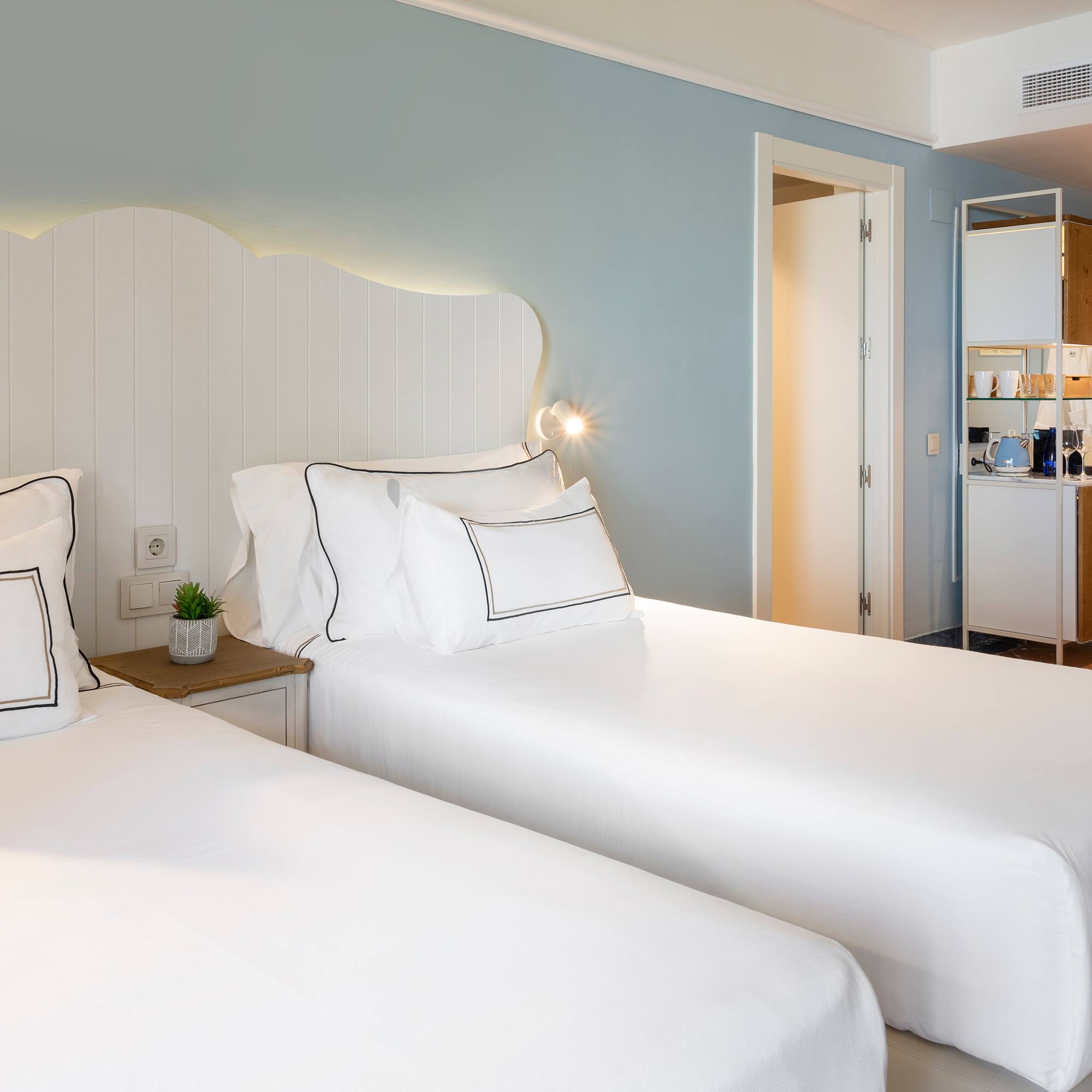 two beds in a hotel room