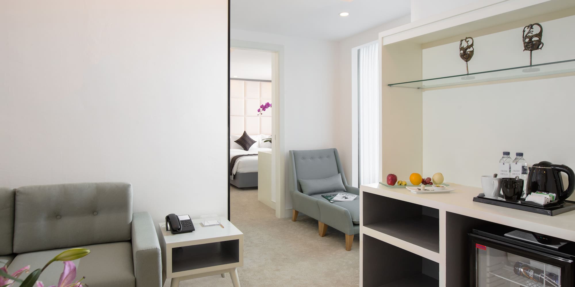 a room with a couch and a tv