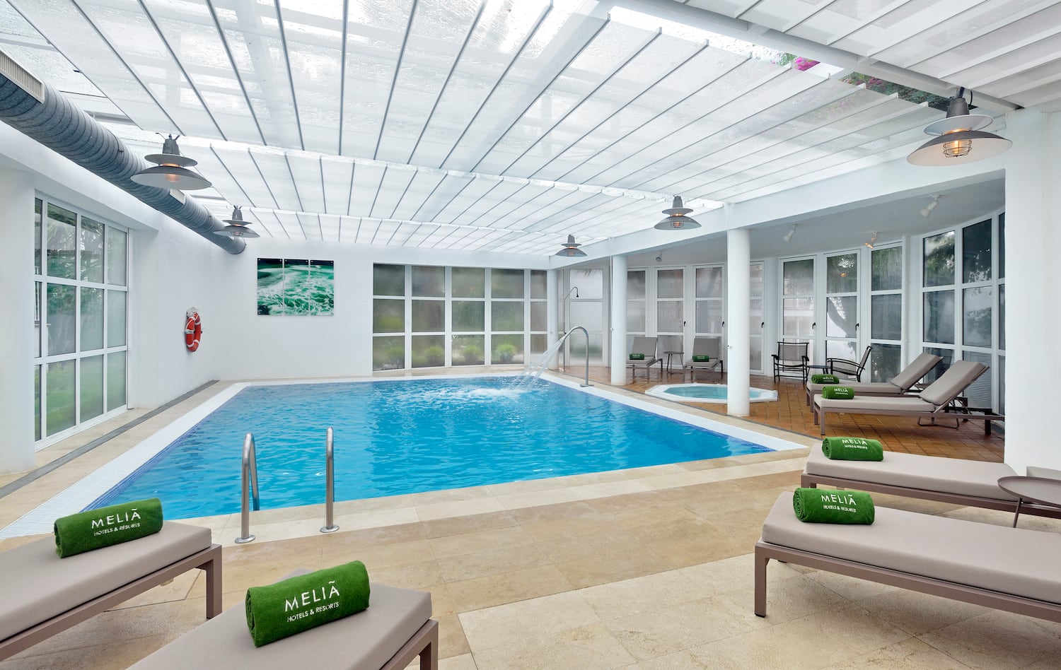 a swimming pool inside a room