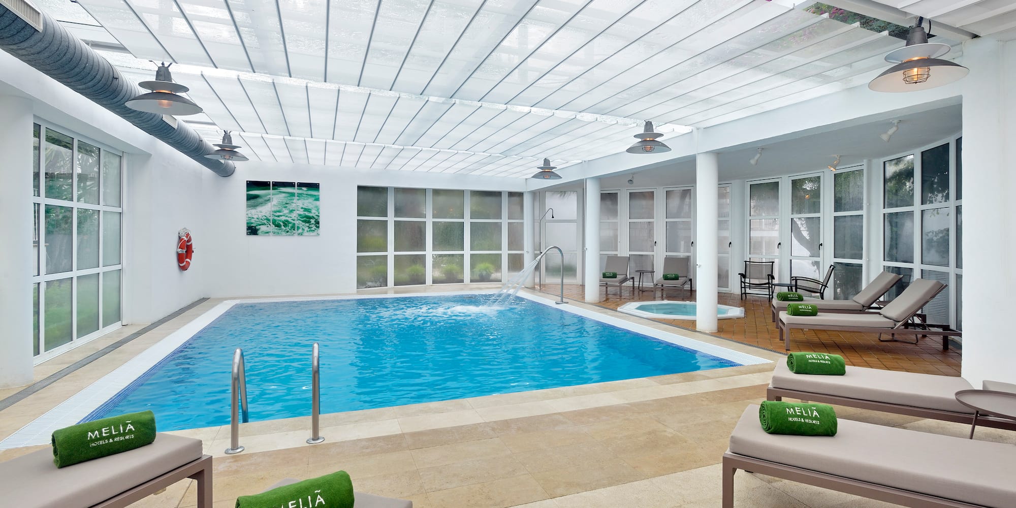 a swimming pool inside a room