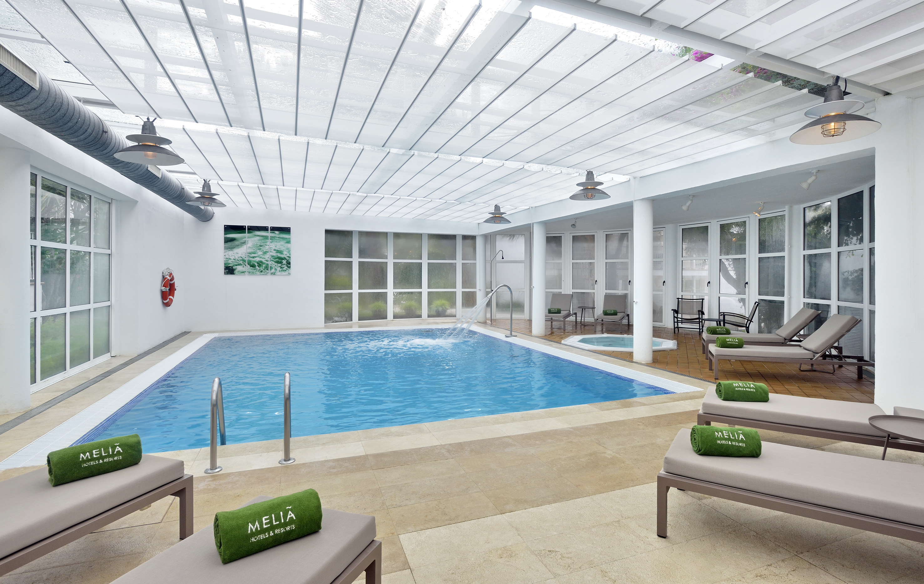 a swimming pool inside a room